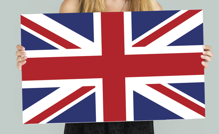 woman-hands-hold-england-uk-flag-patriotism